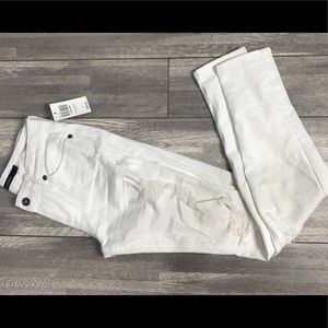 New with tags Black heart, White skinny jeans